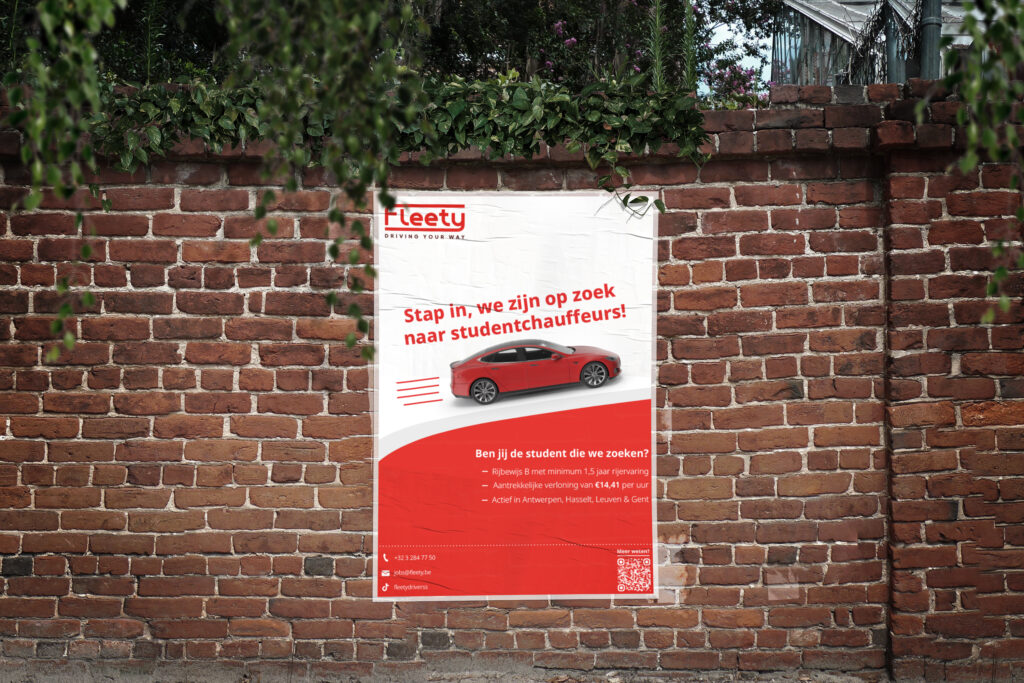 Poster voor Fleety aangebracht op een bakstenen muur